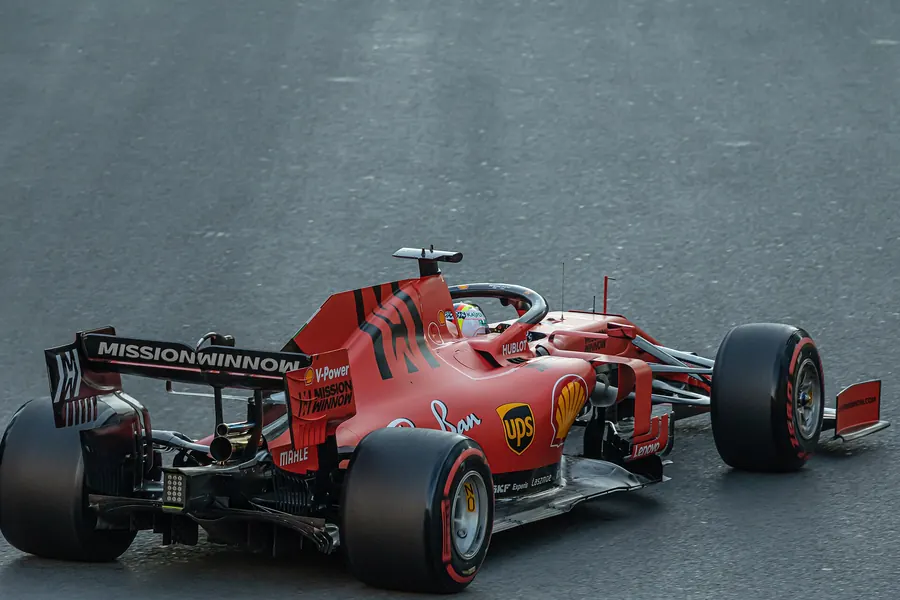 Sebastian Vettel’s red Ferrari seen from behind on the track in Baku, with Pirelli tyres on its rear wheels