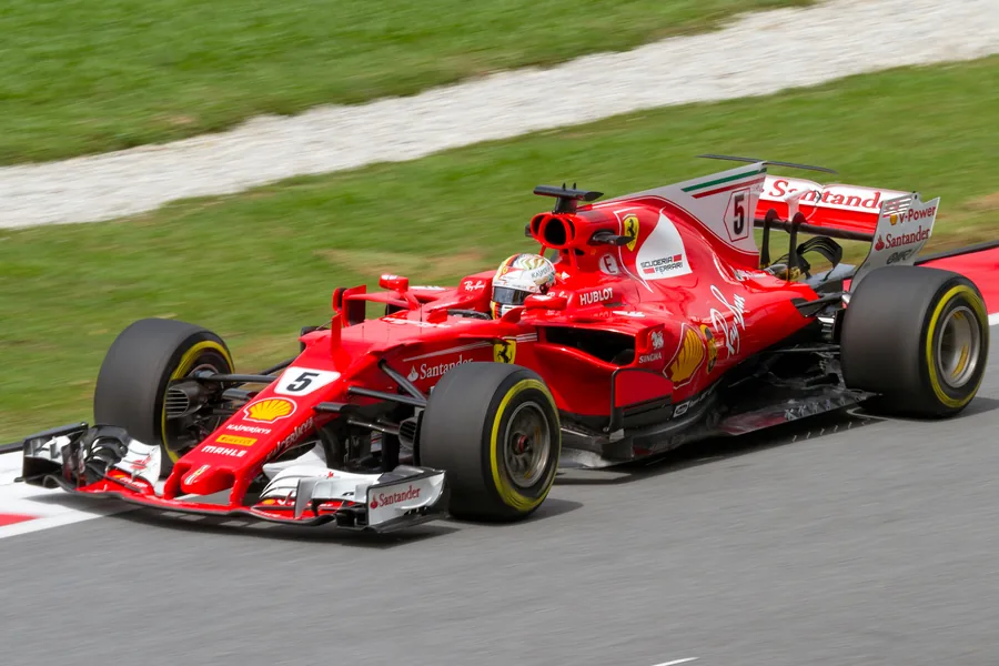 Sebastian Vettel’s red Ferrari cornering at speed at Sepang during second practice for the 2017 Malaysian Grand Prix